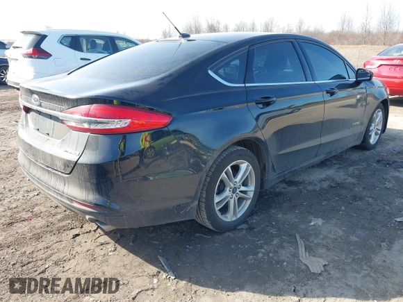 2018 Ford Fusion Hybrid S with VIN 3FA6P0UU4JR101262, listed as a IAAI auction lot 41808442 with 67,537 mi miles. Bid and sale history available at carsss.com. Image 4.