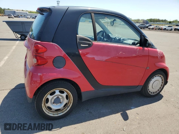2009 Smart fortwo Pure with VIN WMEEJ31X49K322711, listed as a Copart auction lot 58749945 with 58,919 mi miles and Clean title. Bid and sale history available at DreamBid. Image 3.