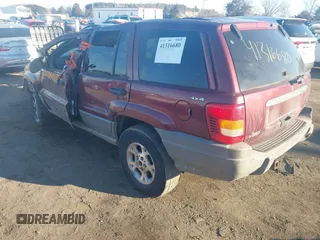 2000 Jeep Grand Cherokee Laredo with VIN 1J4GW48N3YC231743, listed as a IAAI auction lot 41316680 with Not provided miles and . Bid and sale history available at DreamBid. Image 3.
