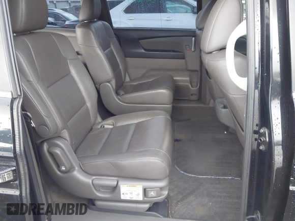 2012 Honda Odyssey EX-L with VIN 5FNRL5H64CB142247, listed as a IAAI auction lot 41722015 with 179,637 mi miles and . Bid and sale history available at carsss.com. Image 8.