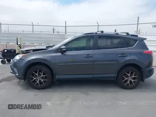 2017 Toyota RAV4 SE with VIN JTMJFREV5HJ155712, listed as a IAAI auction lot 42613998 with 72,112 mi miles and . Bid and sale history available at DreamBid. Image 14.