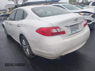 2013 Infiniti M with VIN JN1BY1AP2DM510953, listed as a IAAI auction lot 42157597 with 71,175 mi miles and . Bid and sale history available at DreamBid. Image 3.