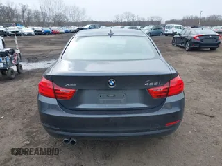 2014 BMW 4 Series 428i xDrive with VIN WBA3N9C50EK246002, listed as a IAAI auction lot 41612256 with 100,915 mi miles and . Bid and sale history available at carsss.com. Image 16.