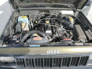 1996 Jeep Cherokee SE z VIN 1J4FJ28S9TL211073, wystawiony jako Copart lot #78052574 z przebiegiem 174 967 mil mil oraz Nie do naprawy • Non repairable. Historia ofert i sprzedaży dostępna na DreamBid. Obrazek 12.