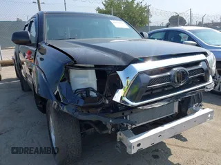 2013 Toyota Tacoma with VIN 5TFJX4CN1DX030720, listed as a IAAI auction lot 42750091 with 88,318 mi miles and . Bid and sale history available at DreamBid. Image 6.
