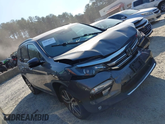 2016 Honda Pilot Elite with VIN 5FNYF6H01GB050555, listed as a IAAI auction lot 41670197 with 140,000 mi miles. Bid and sale history available at carsss.com. Image 13.