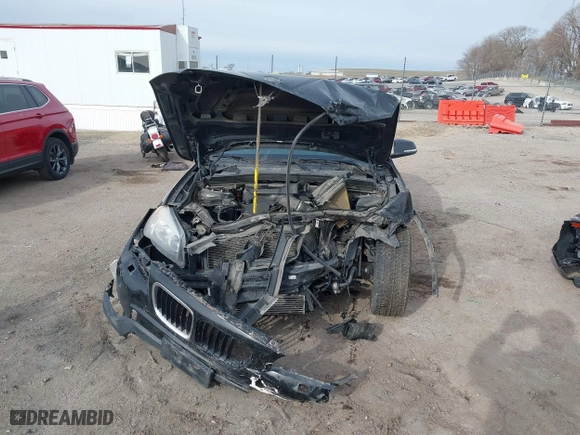 2015 BMW X1 xDrive28i with VIN WBAVL1C57FVY28954, listed as a IAAI auction lot 41857286 with 1 mi miles. Bid and sale history available at carsss.com. Image 6.