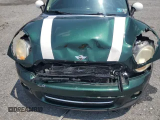 2011 MINI Hardtop with VIN WMWSU3C51BTX95581, listed as a Copart auction lot 60443995 with 157,213 mi miles and Salvage title. Bid and sale history available at DreamBid. Image 11.