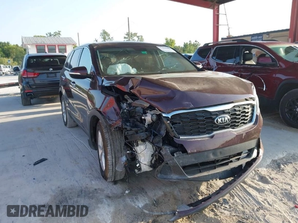 2020 Kia Sorento LX V6 with VIN 5XYPG4A52LG615577, listed as a IAAI auction lot 41865205 with 106,197 mi miles. Bid and sale history available at carsss.com. Image 1.