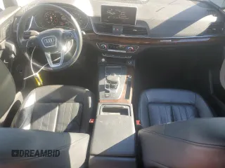 2018 Audi Q5 Premium Plus with VIN WA1BNAFY1J2019346, listed as a Copart auction lot 57487015 with 75,717 mi miles and Salvage title. Bid and sale history available at DreamBid. Image 8.