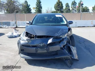 2022 Toyota Prius L Eco with VIN JTDKAMFU4N3177258, listed as a IAAI auction lot 39148811 with 50,902 mi miles. Bid and sale history available at carsss.com. Image 12.