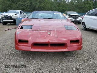 1987 Pontiac Fiero GT z VIN 1G2PG1199HP214795, wystawiony jako Copart lot #75901054 z przebiegiem 206 675 mil mil oraz Szkody całkowita. Historia ofert i sprzedaży dostępna na DreamBid. Obrazek 5.