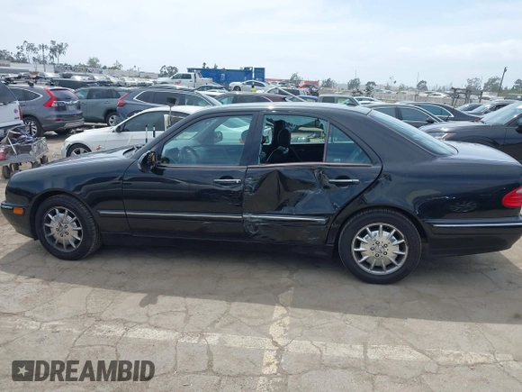 2000 Mercedes-Benz E 320 with VIN WDBJF65J4YB121264, listed as a IAAI auction lot 42245628 with 231,799 mi miles and . Bid and sale history available at DreamBid. Image 14.