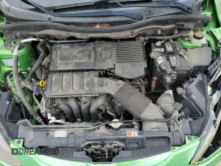 2013 Mazda 2 Sport z VIN JM1DE1KY7D0154285, wystawiony jako Copart lot #58502815 z przebiegiem 74 347 mil mil oraz Szkoda całkowita • Salvage title. Historia ofert i sprzedaży dostępna na DreamBid. Obrazek 11.