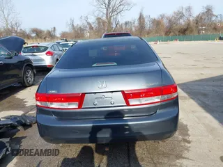 2003 Honda Accord EX z VIN 1HGCM66593A014065, wystawiony jako IAAI lot #41774694 z przebiegiem 163 536 mil mil oraz . Historia ofert i sprzedaży dostępna na DreamBid. Obrazek 17.