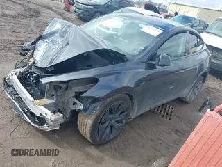 2025 Tesla Model Y Long Range with VIN 7SAYGDED3SF229605, listed as a IAAI auction lot 41726254 with Not Provided miles and . Bid and sale history available at DreamBid. Image 18.