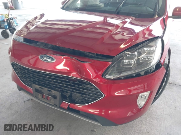 2020 Ford Escape Titanium Hybrid z VIN 1FMCU9DZ1LUC19346, wystawiony jako IAAI lot #41597142 z przebiegiem 75 945 mil mil oraz . Historia ofert i sprzedaży dostępna na DreamBid. Obrazek 6.