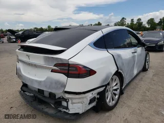 2019 Tesla Model X 75D with VIN 5YJXCAE21KF160589, listed as a Copart auction lot 54390202 with 30,860 mi miles. Bid and sale history available at carsss.com. Image 4.