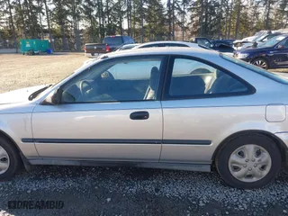 1997 Honda Civic DX with VIN 1HGEJ6223VL095214, listed as a IAAI auction lot 41560717 with 257,409 mi miles. Bid and sale history available at carsss.com. Image 14.