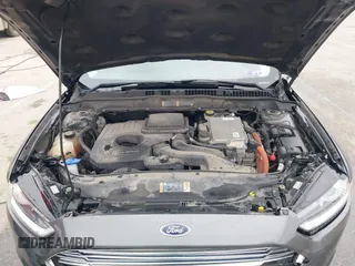 2015 Ford Fusion SE Hybrid with VIN 3FA6P0LU9FR232583, listed as a IAAI auction lot 42012175 with 139,309 mi miles and . Bid and sale history available at DreamBid. Image 10.
