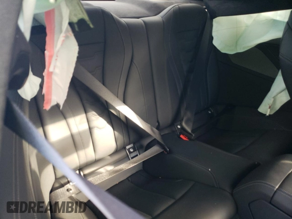 2022 BMW 8 Series M850i xDrive z VIN WBABC4C01NCJ64525, wystawiony jako Copart lot #83996594 z przebiegiem Nie podano mil oraz Szkoda całkowita • Salvage title. Historia ofert i sprzedaży dostępna na DreamBid. Obrazek 10.