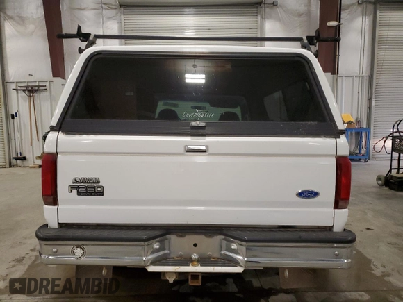 1997 Ford F-250 with VIN 1FTHX25F7VEC46738, listed as a Copart auction lot 59603125 with 211,004 mi miles and Salvage title. Bid and sale history available at DreamBid. Image 6.
