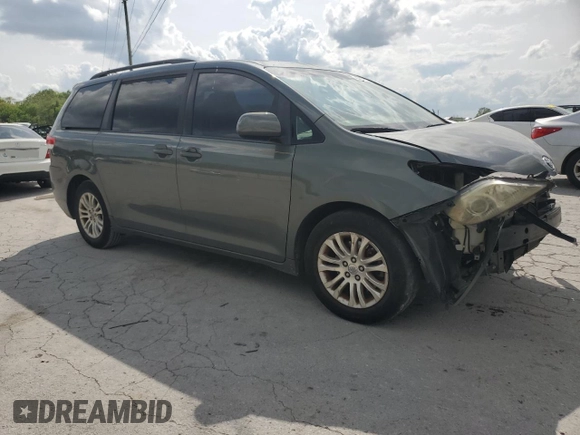 2014 Toyota Sienna XLE with VIN 5TDYK3DC2ES439353, listed as a Copart auction lot 54332275 with 130,312 mi miles and Salvage Title. Bid and sale history available at DreamBid. Image 4.