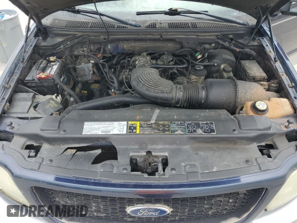 2003 Ford F-150 XL with VIN 2FTRX17L83CA53082, listed as a Copart auction lot 63836305 with 219,269 mi miles and Salvage title. Bid and sale history available at DreamBid. Image 11.