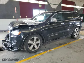 2014 Jeep Grand Cherokee Overland with VIN 1C4RJFCG7EC209452, listed as a Copart auction lot 88752795 with 102,725 mi miles and Salvage Title. Bid and sale history available at carsss.com. Image 1.
