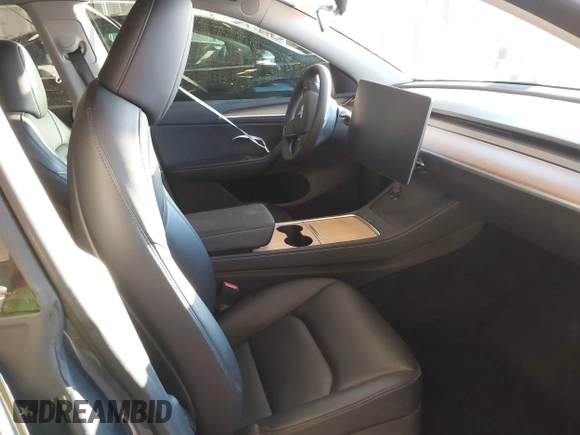 2023 Tesla Model Y Long Range with VIN 7SAYGDEE5PA033341, listed as a IAAI auction lot 41379625 with Not provided miles and . Bid and sale history available at DreamBid. Image 5.