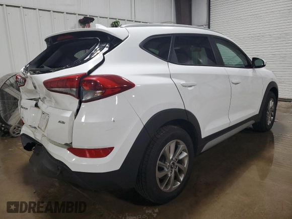 2018 Hyundai Tucson SEL with VIN KM8J3CA41JU713882, listed as a Copart auction lot 56280825 with 140,463 mi miles and Salvage title. Bid and sale history available at DreamBid. Image 3.