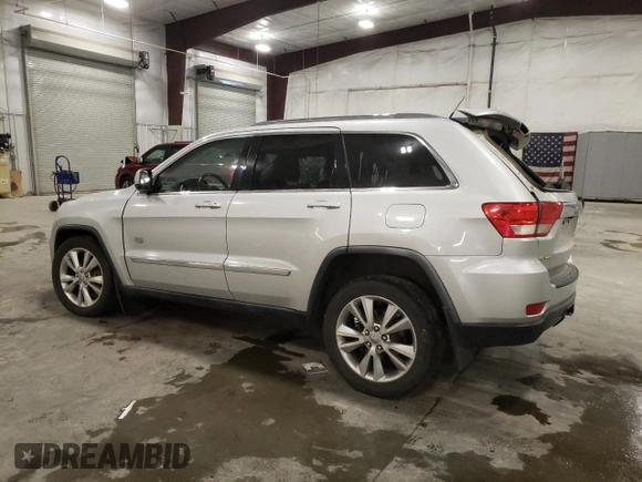 2011 Jeep Grand Cherokee 70th Anniversary with VIN 1J4RR4GG0BC666357, listed as a Copart auction lot 71726674 with 122,802 mi miles and Salvage Title. Bid and sale history available at carsss.com. Image 2.