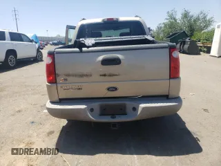 2004 Ford Explorer Sport Trac XLS z VIN 1FMZU67K34UC40112, wystawiony jako Copart lot #57877855 z przebiegiem 139 350 mil mil oraz Szkoda całkowita • Salvage title. Historia ofert i sprzedaży dostępna na DreamBid. Obrazek 6.