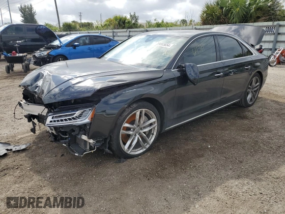 2015 Audi A8 4.0T with VIN WAUJ2AFD5FN013267, listed as a Copart auction lot 39065654 with 64,541 mi miles and . Bid and sale history available at DreamBid. Image 1.