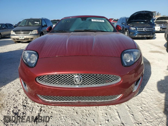 2013 Jaguar XK with VIN SAJWA4GB9DLB51059, listed as a Copart auction lot 77322014 with Not Provided miles and Salvage Title. Bid and sale history available at carsss.com. Image 5.