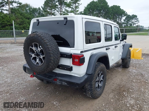 2021 Jeep Wrangler Unlimited Rubicon with VIN 1C4JJXFM9MW774142, listed as a IAAI auction lot 42625007 with 42,318 mi miles and . Bid and sale history available at DreamBid. Image 6.