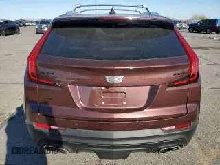 2023 Cadillac XT4 AWD Luxury with VIN 1GYFZBR42PF107893, listed as a Copart auction lot 74989124 with 9,579 mi miles and Salvage Title. Bid and sale history available at carsss.com. Image 6.
