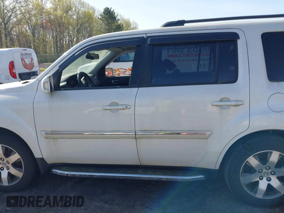 2013 Honda Pilot Touring with VIN 5FNYF4H97DB069979, listed as a IAAI auction lot 42133922 with 276,574 mi miles and . Bid and sale history available at carsss.com. Image 14.
