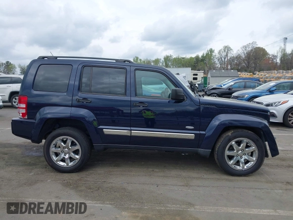 2012 Jeep Liberty Sport with VIN 1C4PJMAK2CW210975, listed as a IAAI auction lot 41904478 with 136,462 mi miles. Bid and sale history available at carsss.com. Image 14.
