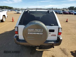 2001 Isuzu Rodeo S with VIN 4S2DM58W114343183, listed as a Copart auction lot 88128465 with 85,926 mi miles and Salvage Title. Bid and sale history available at DreamBid. Image 6.