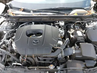 2023 Mazda 3 S Premium with VIN 3MZBPBDM8PM373434, listed as a IAAI auction lot 41234729 with 9,387 mi miles and . Bid and sale history available at DreamBid. Image 10.