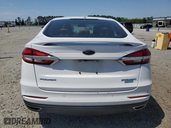 2020 Ford Fusion Titanium с VIN 3FA6P0K99LR174094, выставлен на аукционе Copart как лот 52583435 с пробегом 98 389 миль миль и Списание • Salvage title. История ставок и продаж доступна на DreamBid. Изображение 6.
