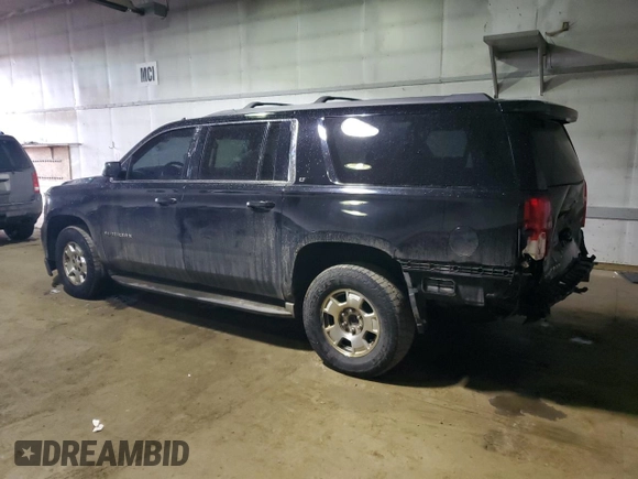 2015 Chevrolet Suburban LT with VIN 1GNSKJKC6FR262570, listed as a Copart auction lot 46907675 with 179,425 mi miles and Clean Title. Bid and sale history available at DreamBid. Image 2.