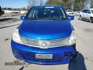 2009 Nissan Versa 1.8 SL with VIN 3N1BC13E69L407515, listed as a Copart auction lot 42767375 with 134,489 mi miles and Salvage Title. Bid and sale history available at carsss.com. Image 5.