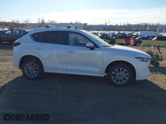 2024 Mazda CX-5 2.5 S Preferred Package with VIN JM3KFBCL5R0516853, listed as a IAAI auction lot 40859077 with 397 mi miles. Bid and sale history available at carsss.com. Image 14.