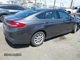 2017 Ford Fusion S with VIN 3FA6P0G73HR343623, listed as a IAAI auction lot 41957903 with 100,544 mi miles. Bid and sale history available at carsss.com. Image 4.
