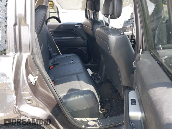 2016 Jeep Compass High Altitude Edition with VIN 1C4NJDEB0GD558230, listed as a IAAI auction lot 39799941 with 57,002 mi miles. Bid and sale history available at carsss.com. Image 8.