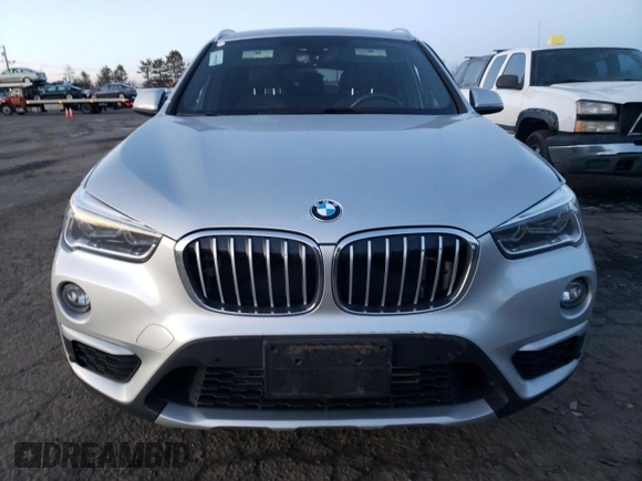 2017 BMW X1 xDrive28i with VIN WBXHT3C37H5F79624, listed as a Copart auction lot 71048542 with 48,425 mi miles. Bid and sale history available at carsss.com. Image 5.