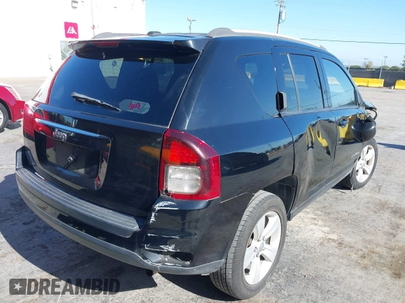 2016 Jeep Compass Sport with VIN 1C4NJCBA7GD648822, listed as a IAAI auction lot 42272188 with 79,929 mi miles and . Bid and sale history available at DreamBid. Image 4.