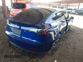 2023 Tesla Model 3 z VIN 5YJ3E1EA2PF557011, wystawiony jako IAAI lot #42347980 z przebiegiem 15 358 mil mil oraz . Historia ofert i sprzedaży dostępna na DreamBid. Obrazek 4.